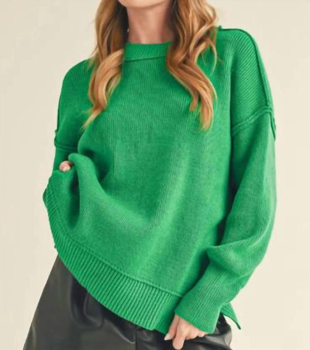 NEW AEMI + CO ina crewneck sweater in contemporary green
